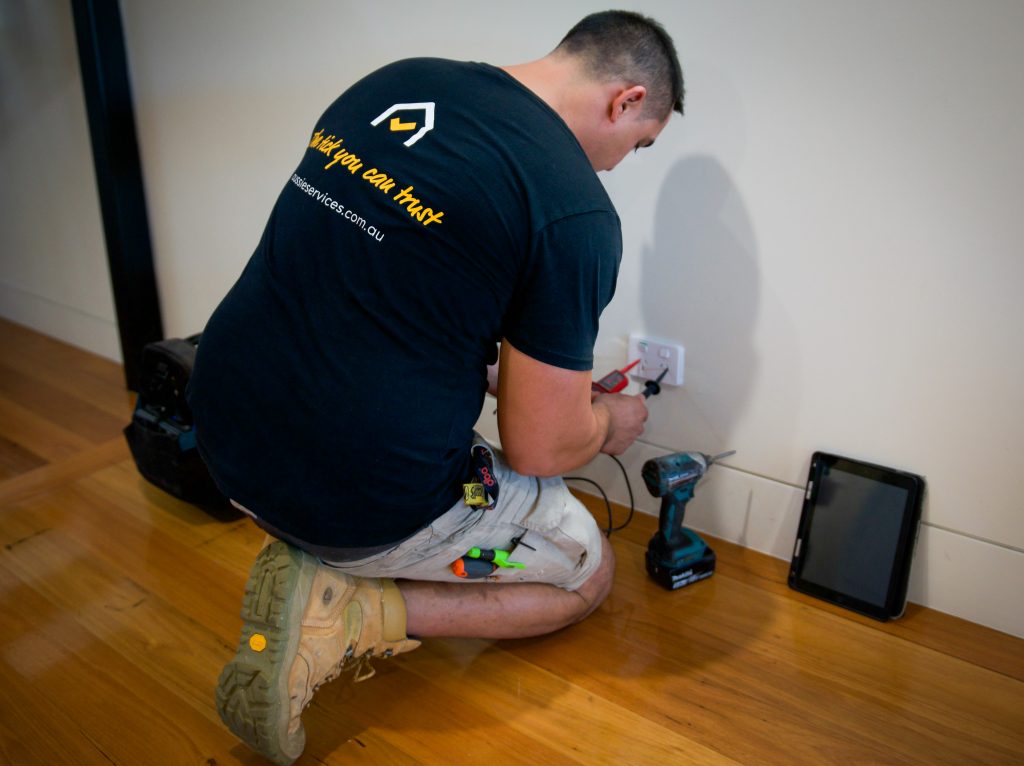 Aussie Electrical & Plumbing doing electrical services.
